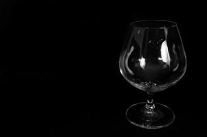 Empty glass for brandy whiskey or bourbon photo