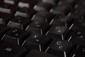 Abstract background of black computer keyboard photo