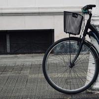 wheel of the bicycle on the street photo