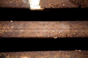 Close up of metal grille of sewer photo