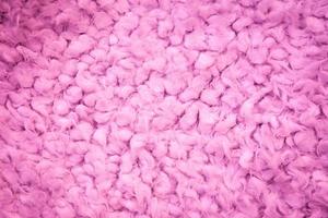 Close-up of pink wool fur texture background photo