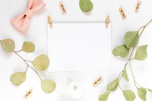 Beautiful greeting card idea with area for your text with sprigs and leaves photo