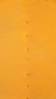 Fondo de puerta amarilla abstracta vertical foto