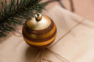 Christmas ball hanging on a Christmas tree branch photo