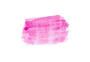 Light pink smear of acrylic paint isolated on white background photo