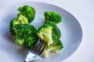 Healthy broccoli in a plate photo