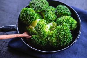 Cook fresh broccoli vegetables Health food photo