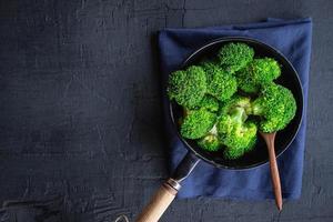 Cook fresh broccoli vegetables Health food photo