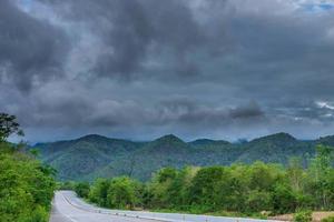 Pouring rain and clouds over the mountains photo