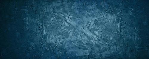 Dark blue grunge and texture cement or concreate background photo