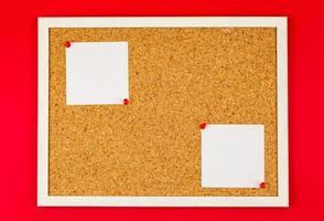 Abstract paper note pin on cork board photo