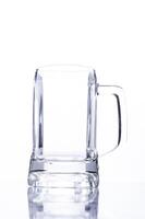 Empty Beer Glass on white background photo