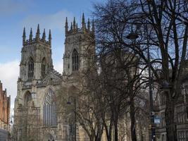 Towers of York Minster seen from Duncombe Place York England photo