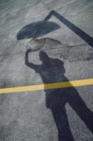 street basket shadows on the ground photo