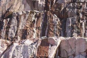 The granite rock lined with explosions photo