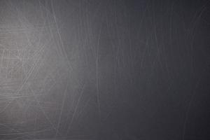 Scratchy black smooth grunge blank background photo