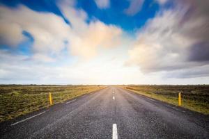 Sunset over the road in iceland photo