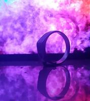 Ring on abstract colorful background image photo