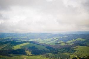 Mountain landscape with cloudy sky photo