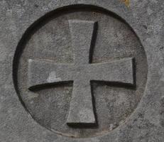 Maltese cross in a cemetery photo