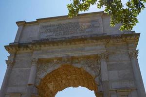 The Triumphal Arch of Titus in Rome Italy photo