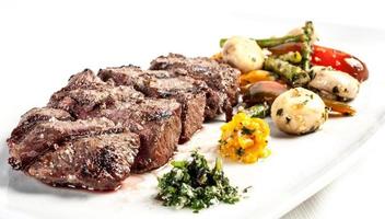 Grilled beef steak with french fries photo