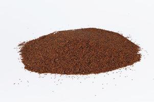 Heap of red quinoa isolated on white background photo
