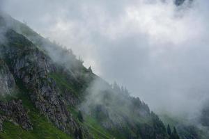 Granite mountains and clouds photo