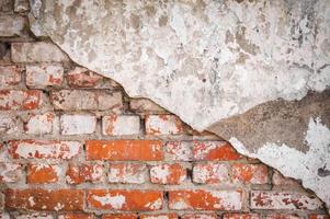 Old ruined brick wall close up view photo