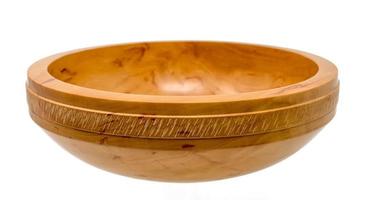 Hand turned wooden bowl made of light pearwood with all round decoration photo