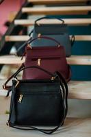 Beautiful bags compliment the style of a beautifully dressed girl photo