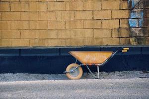 wheelbarrow on the street photo