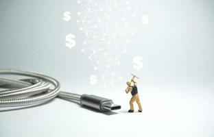 Technician figure standing in front of usb cable, 3d concept photo