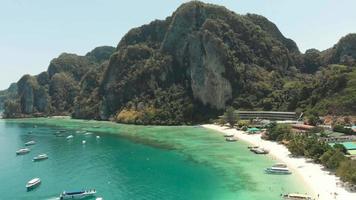 Tropical beach of Ko Phi Phi Islands , Thailand. Aerial forward video