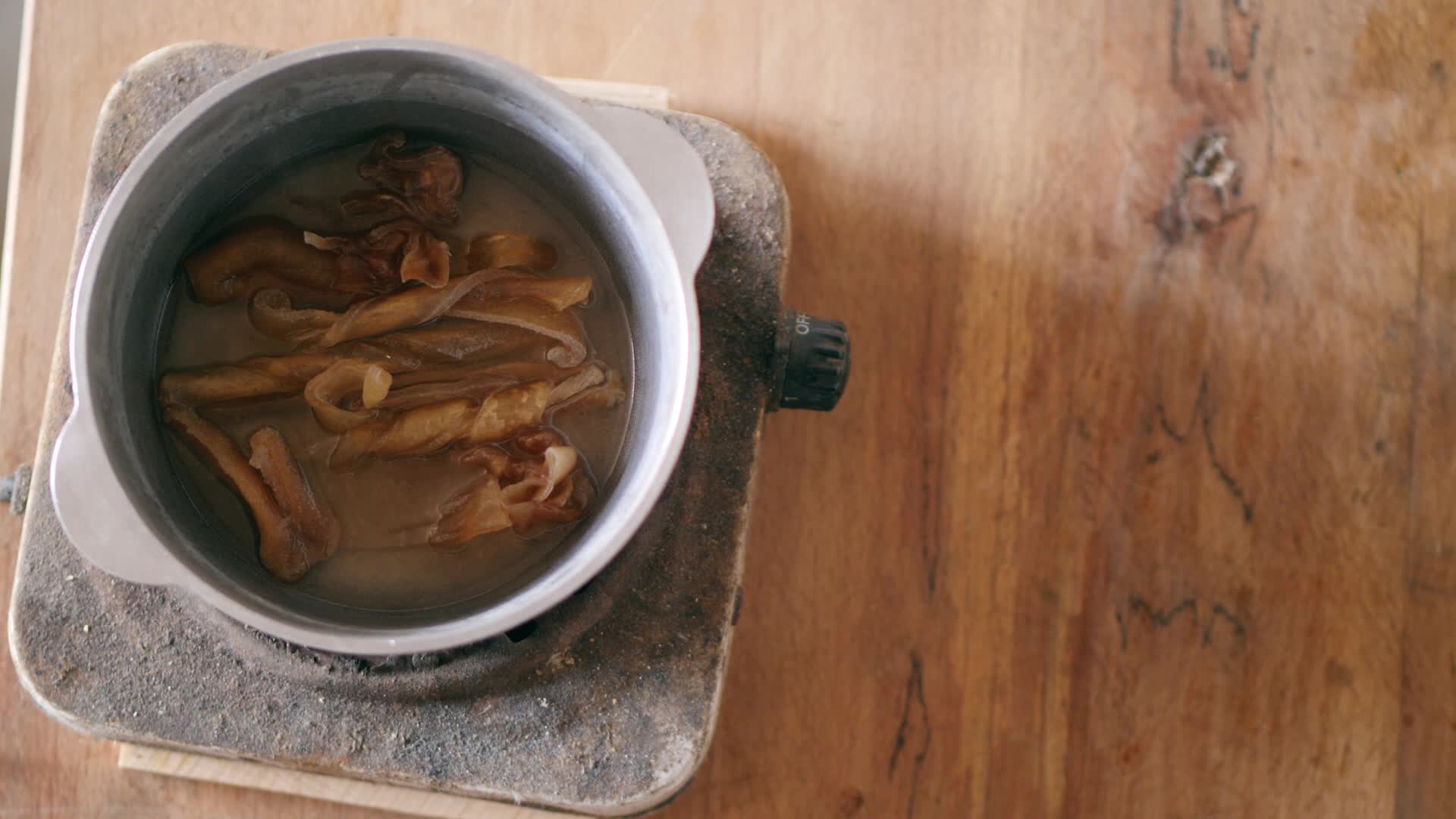 boiling glue for wood from pork skins 2459862 Stock Video at Vecteezy