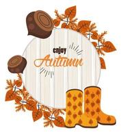 enjoy autumn lettering with nuts and boots in wooden background vector