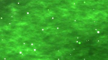 fließender grüner Teilchenraumhintergrund