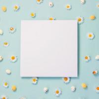 Floral background with paper card note photo