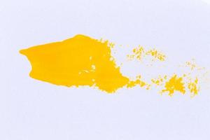 Paint brush stroke texture background of yellow watercolor photo