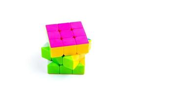 Multi-colored cube on a white background photo