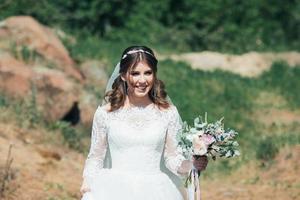 Rustic style emotions of the bride in nature photo