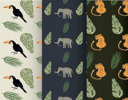 wild animals and tropical leafs patterns vector