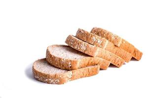 Slice whole wheat bread isolated on white background photo