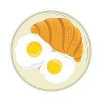 desayuno huevo y croissant
