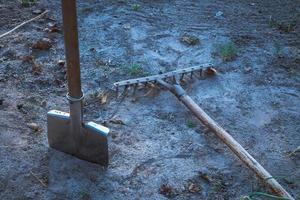 Shovel rake in land photo