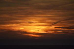 Orange clouds during sunset photo