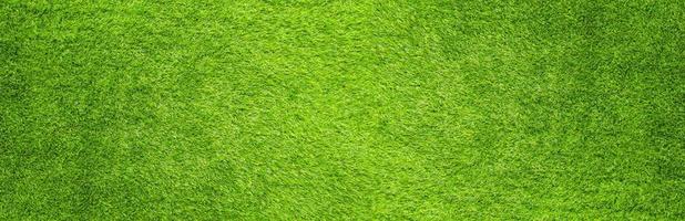 The artificial green grass pattern texture background photo