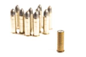 Think different     group of bullets and single bullet photo