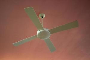 Ceiling fan with pink ceiling photo