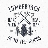 Lumberjack vintage label with two axes and trees. Hand drawn textured grunge vintage label, retro badge or T-shirt typography design, hipster T-shirt print design. Hand drawn vector illustration